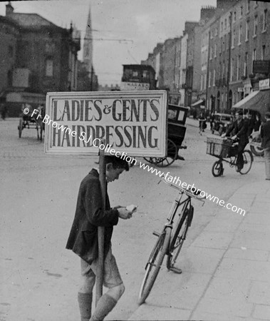 BOY WITH HAIRDRESSING ADVT, O'CONNELL BRIDGE